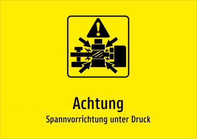 Achtung - Spannvorrichtung unter Druck