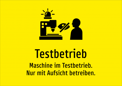 Testbetrieb - Maschine im Testbetrieb. Nur mit Aufsicht betreiben.