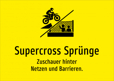 Supercross Sprünge - Zuschauer hinter Netzen und Barrieren.
