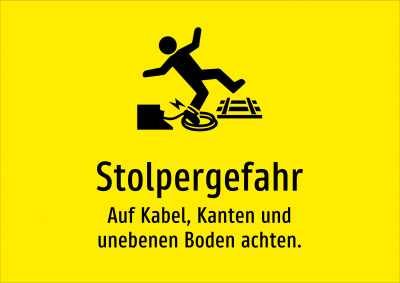 Stolpergefahr - Auf Kabel, Kanten und unebenen Boden achten.