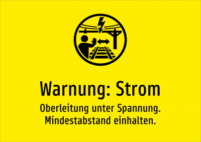 Warnung: Strom - Oberleitung unter Spannung. Mindestabstand einhalten.